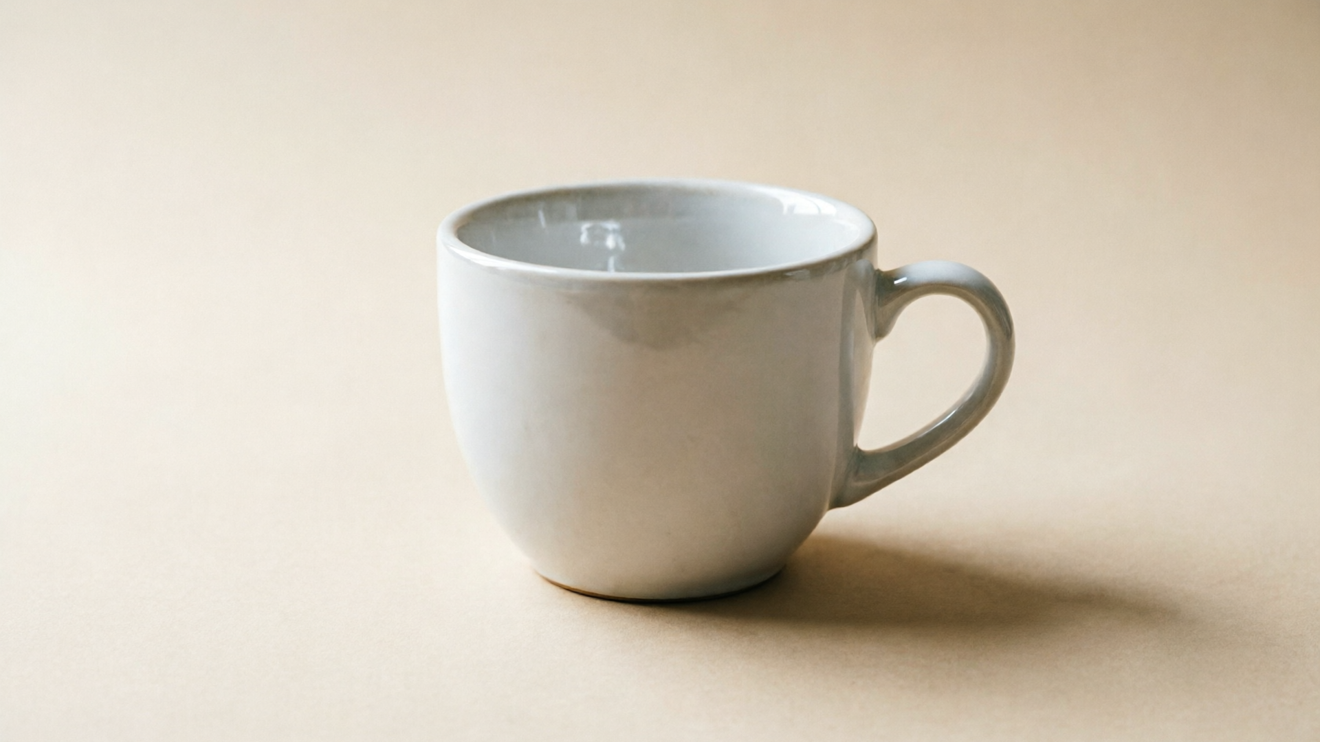 Minimalist product hero with soft rim light and neutral background