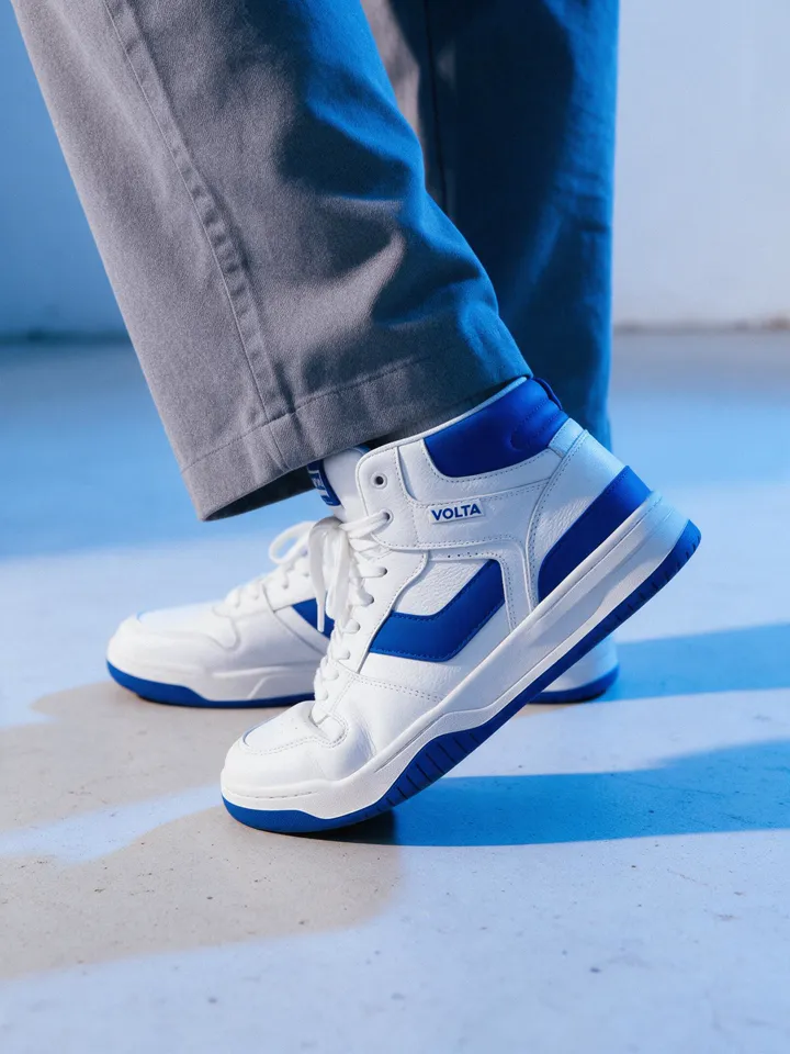 Volta high-tops mid-step on concrete
