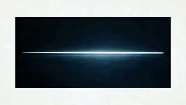 AI-generated video still: a thin line of light unfolding into a dense branching lattice on deep indigo