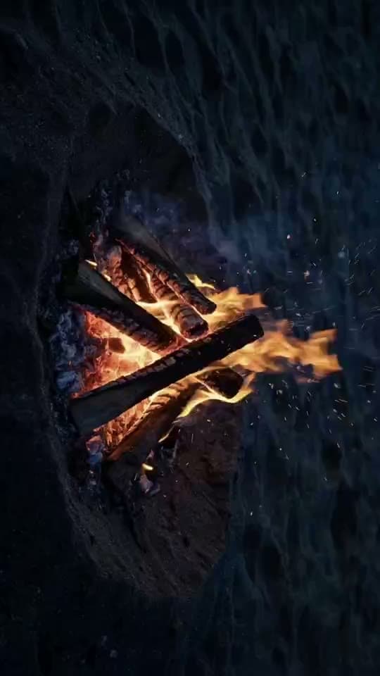 Ember Burst AI video effect — sparks scatter outward across the frame